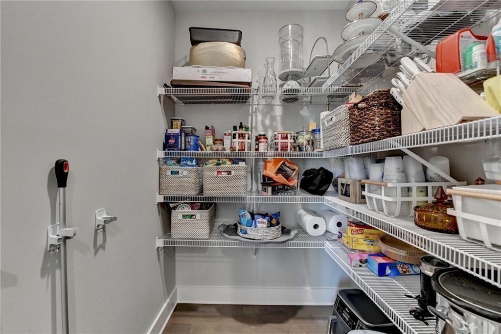6065 Cushing Circle Norcross, GA 30071 - Photo 21 of 44 a kitchen with stainless steel appliances granite countertop a sink and stove