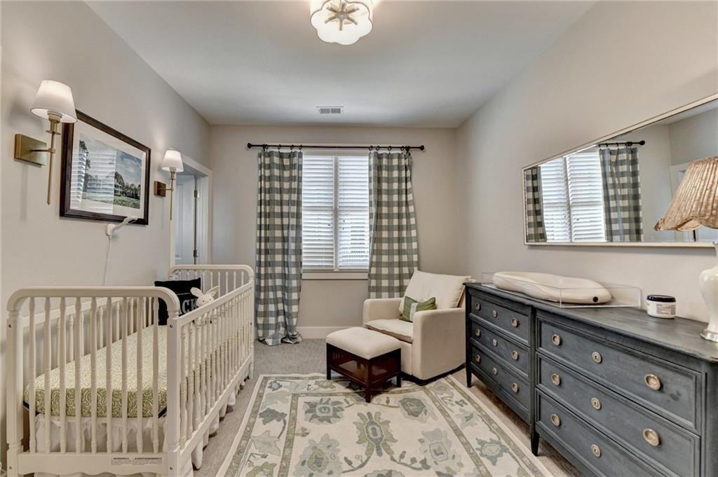 6065 Cushing Circle Norcross, GA 30071 - Photo 33 of 44 a bed room with furniture and a window