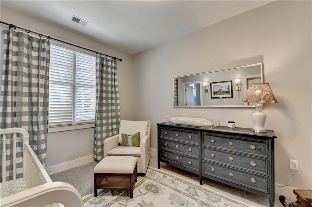 6065 Cushing Circle Norcross, GA 30071 - Photo 34 of 44 a living room with furniture and wooden floor