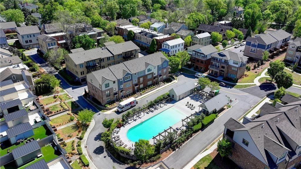 6065 Cushing Circle Norcross, GA 30071 - Photo 44 of 44 an aerial view of a house with a garden and lots of trees