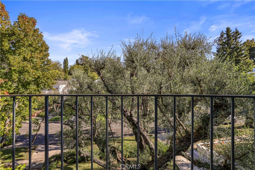 14015 Roblar Road Sherman Oaks, CA 91423 - Photo 19 of 35 a view of a balcony with a forest