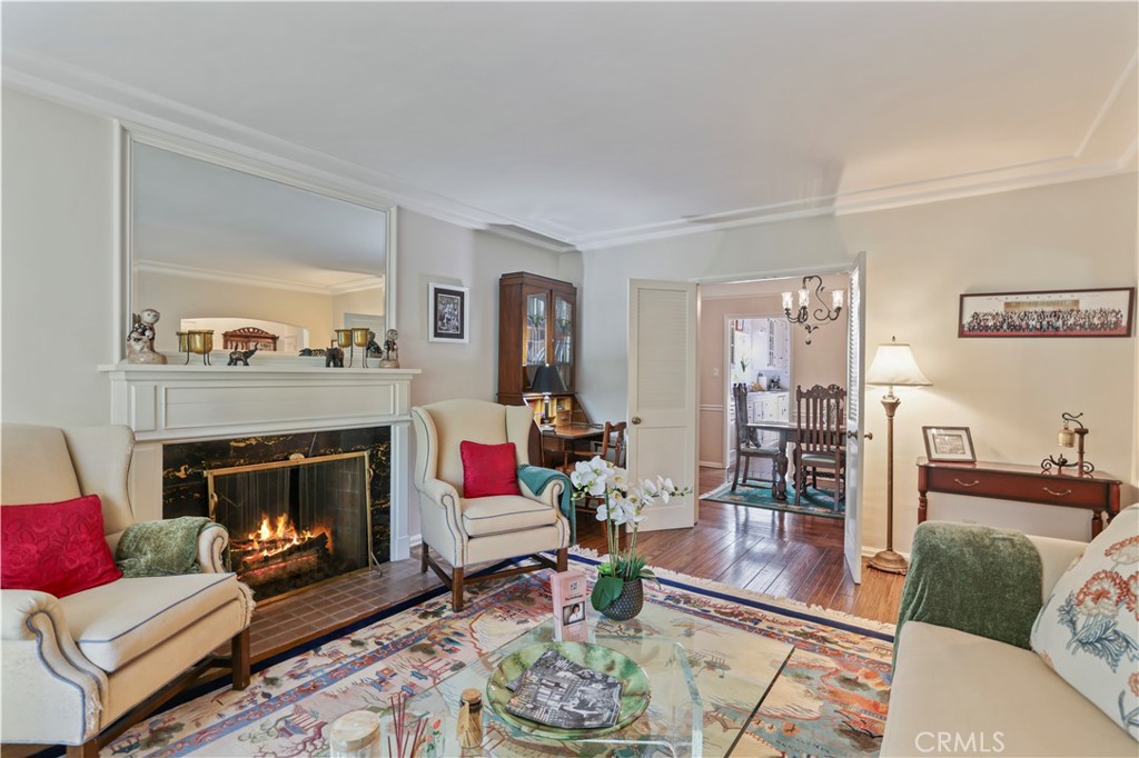 14015 Roblar Road Sherman Oaks, CA 91423 - Photo 4 of 35 a living room with furniture and a fireplace