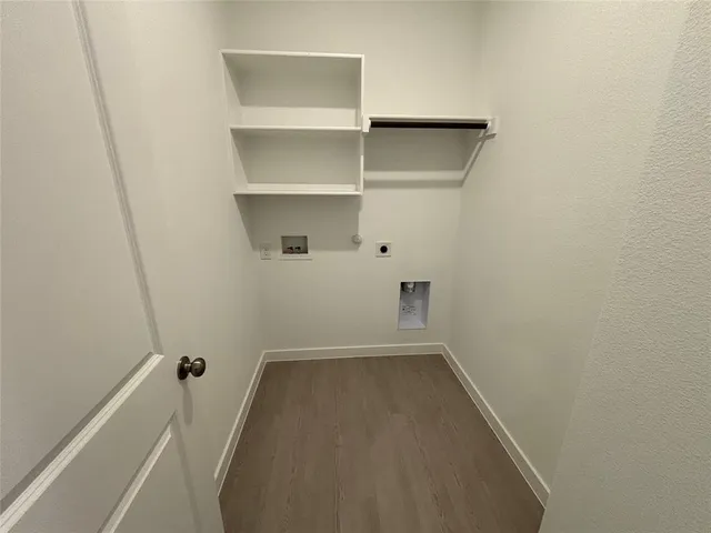 a view of a room with shelf on the wall