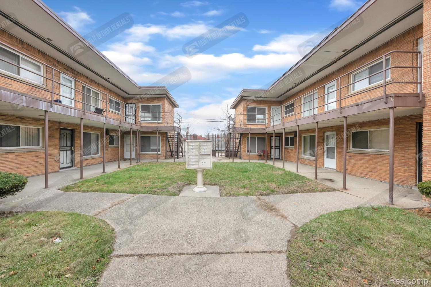 16721 Greenfield Road, Unit 5 Detroit, MI 48235 - Photo 17 of 18 View of home's community featuring a balcony and a yard