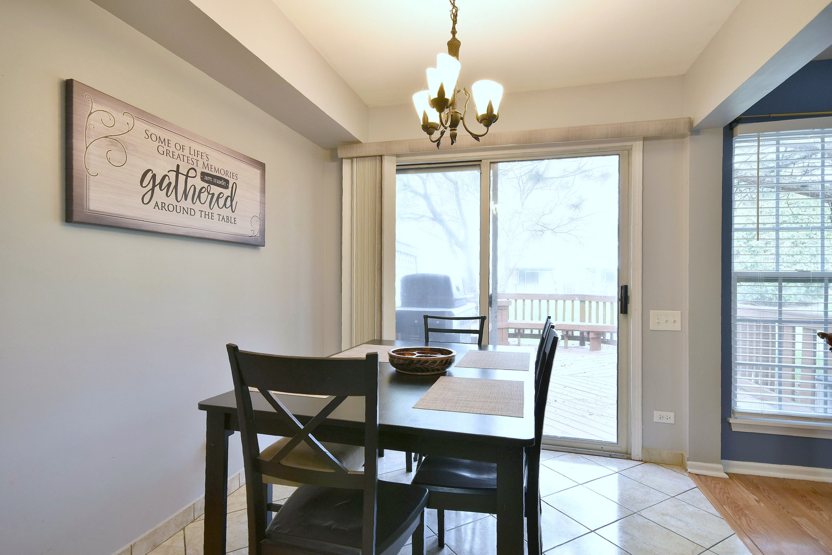 210 Shadybrook Lane Aurora, IL 60504 - Photo 13 of 26 a view of a dining room with furniture large windows and wooden floor