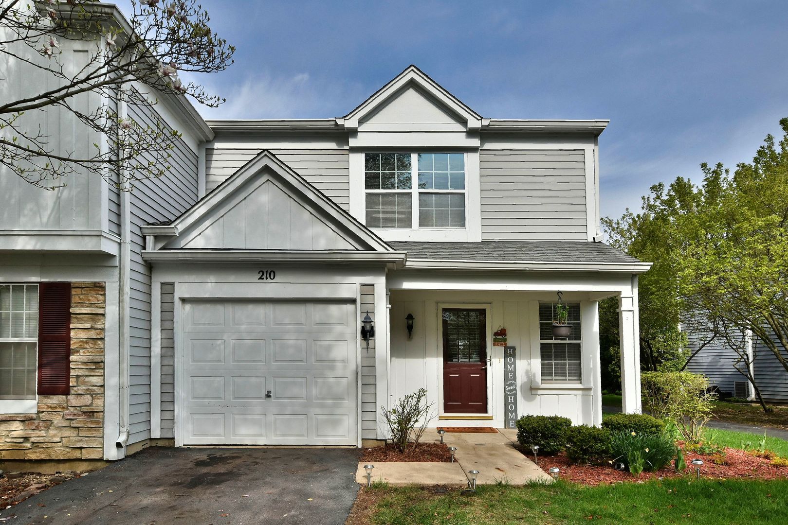210 Shadybrook Lane Aurora, IL 60504 - Photo 2 of 26 front view of a house with a yard