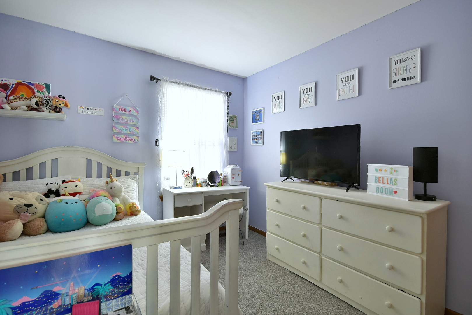 210 Shadybrook Lane Aurora, IL 60504 - Photo 21 of 26 a living room with furniture and a flat screen tv