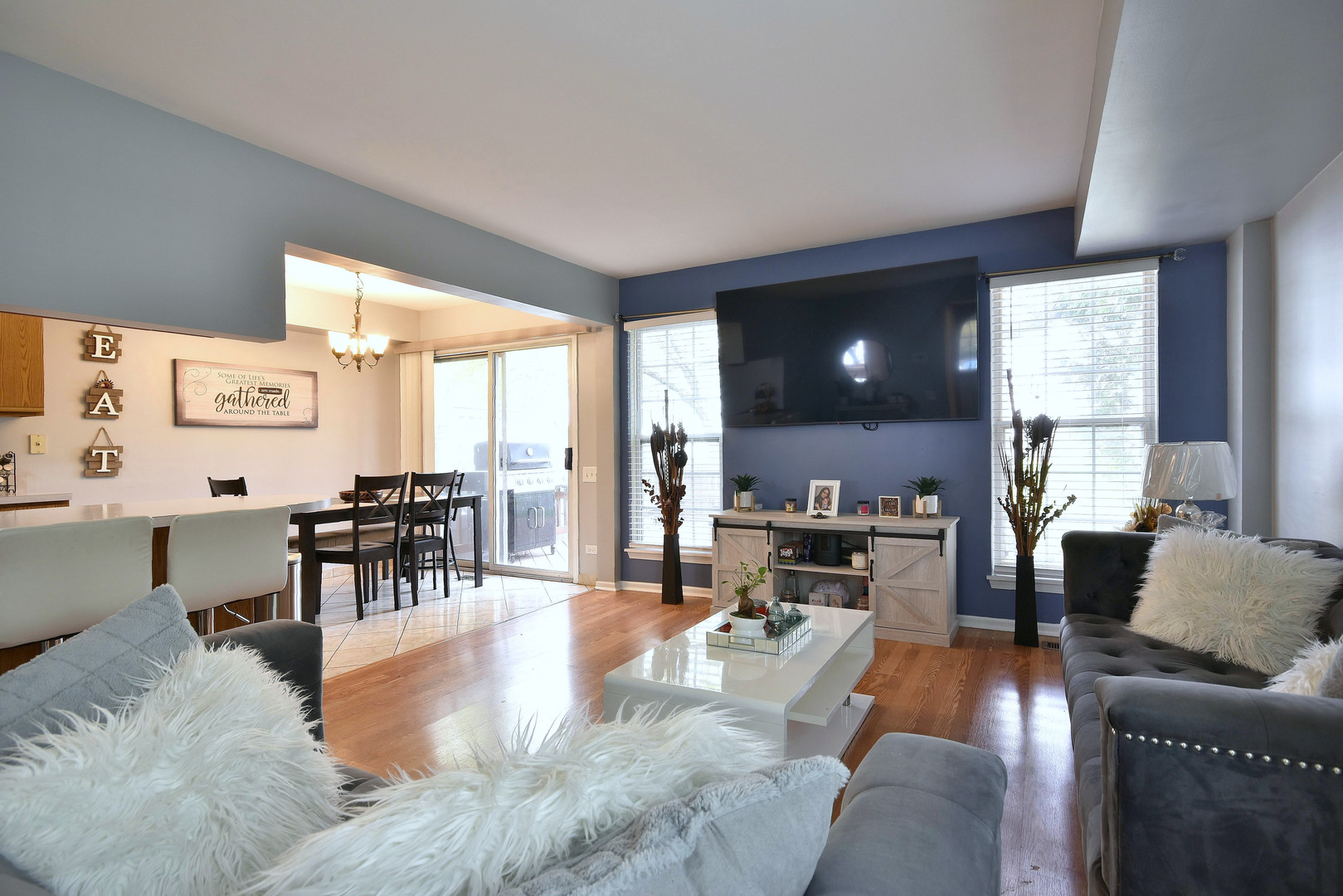 210 Shadybrook Lane Aurora, IL 60504 - Photo 10 of 26 a living room with furniture and large windows
