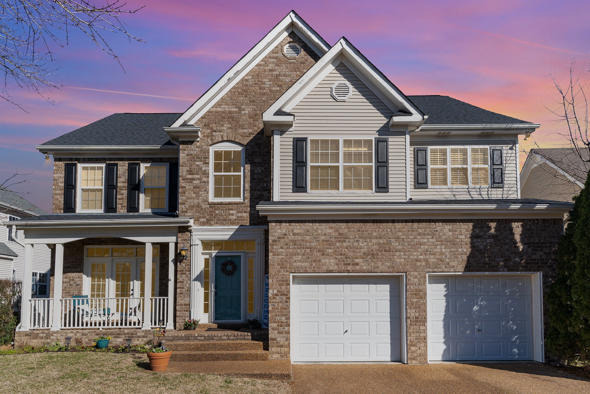 3053 Romain Trail Spring Hill, TN 37174 - Photo 1 of 32 a front view of a house with a yard