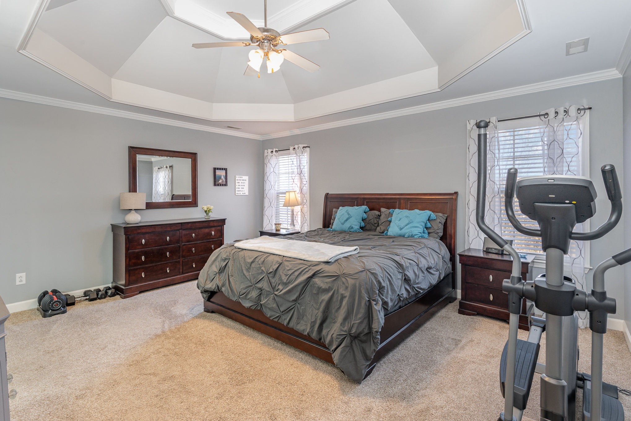 3053 Romain Trail Spring Hill, TN 37174 - Photo 17 of 32 a bedroom with a bed and a chandelier