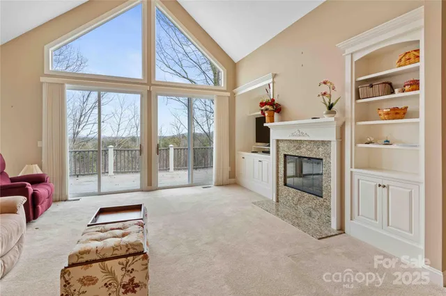 a bedroom with furniture and a fireplace