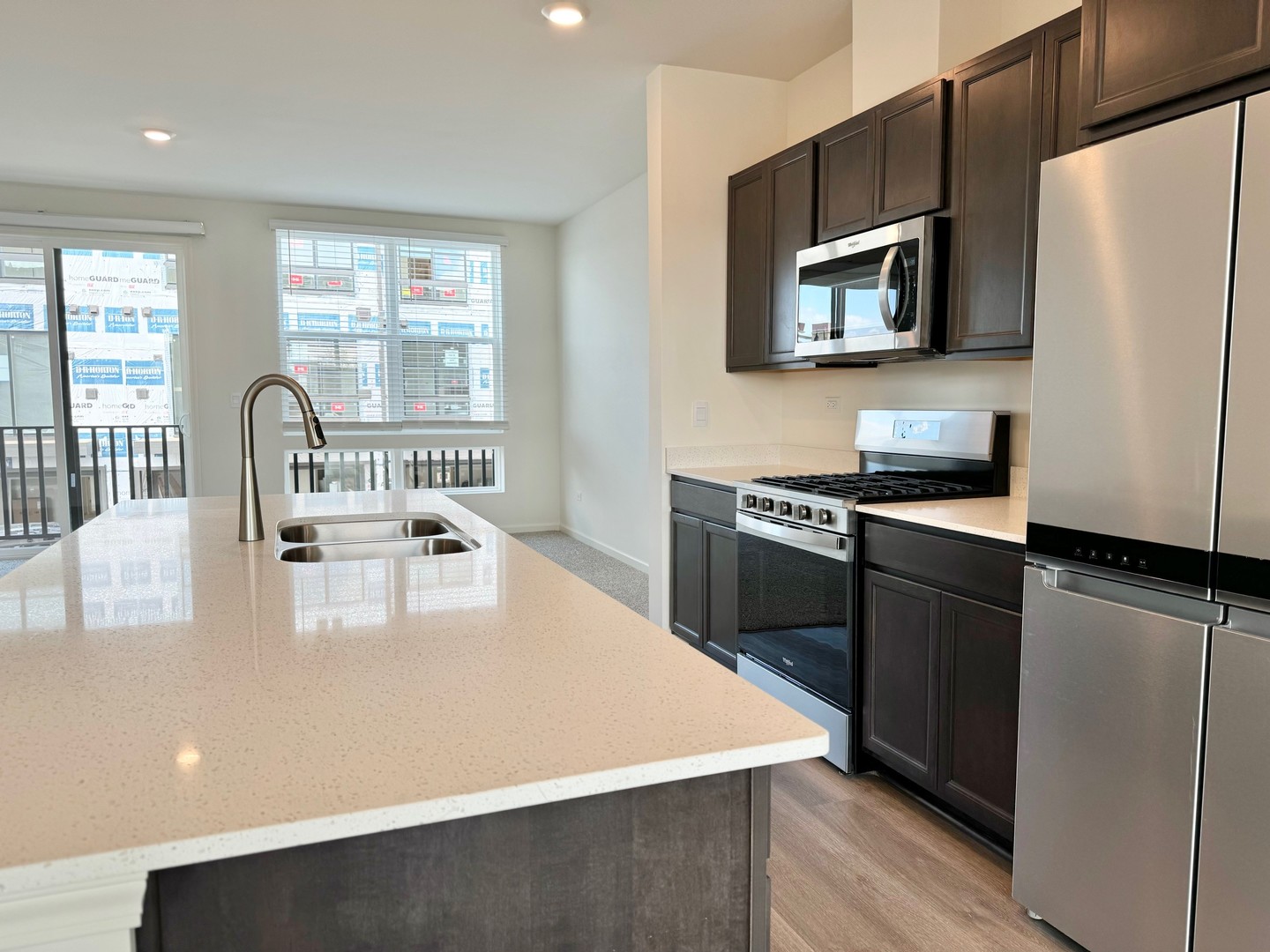 369 Summit Circle Lombard, IL 60148 - Photo 4 of 45 a kitchen with a refrigerator stove and sink