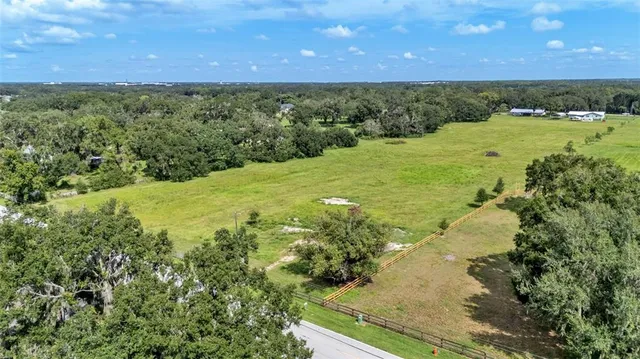 a view of an ocean and a yard