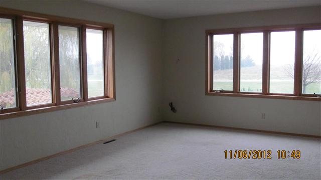 9947 East Center Road Stockton, IL 61085 - Photo 4 of 11 an empty room with a window