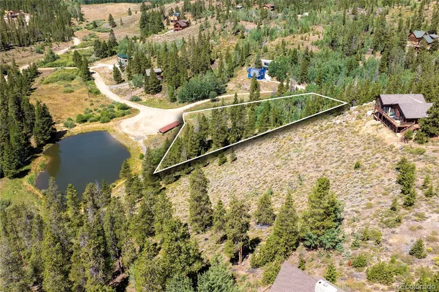 a view of a city with mountains in the background