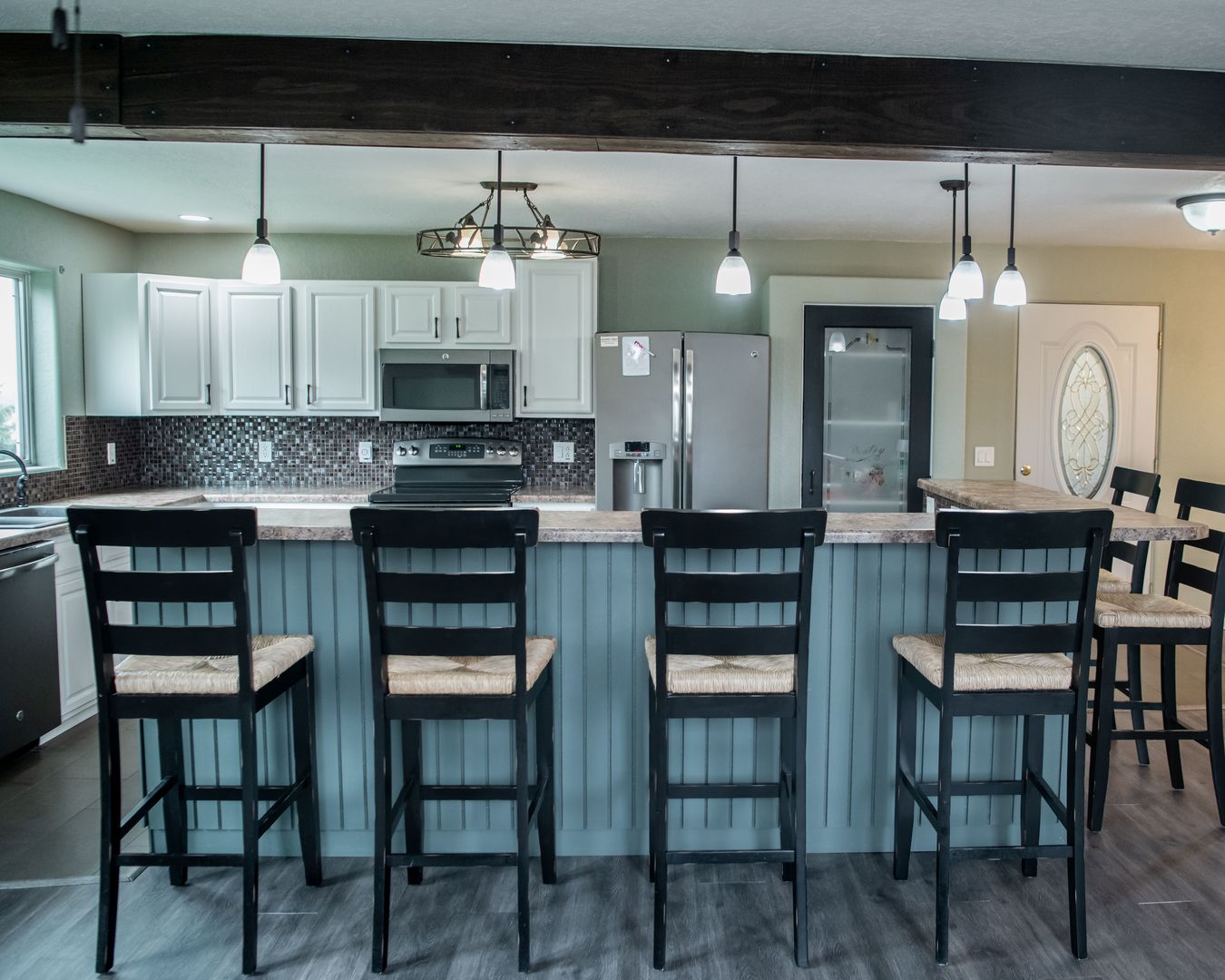 20532 Pilgrim Road Chadwick, IL 61014 - Photo 21 of 54 a kitchen with kitchen island granite countertop a table and chairs in it