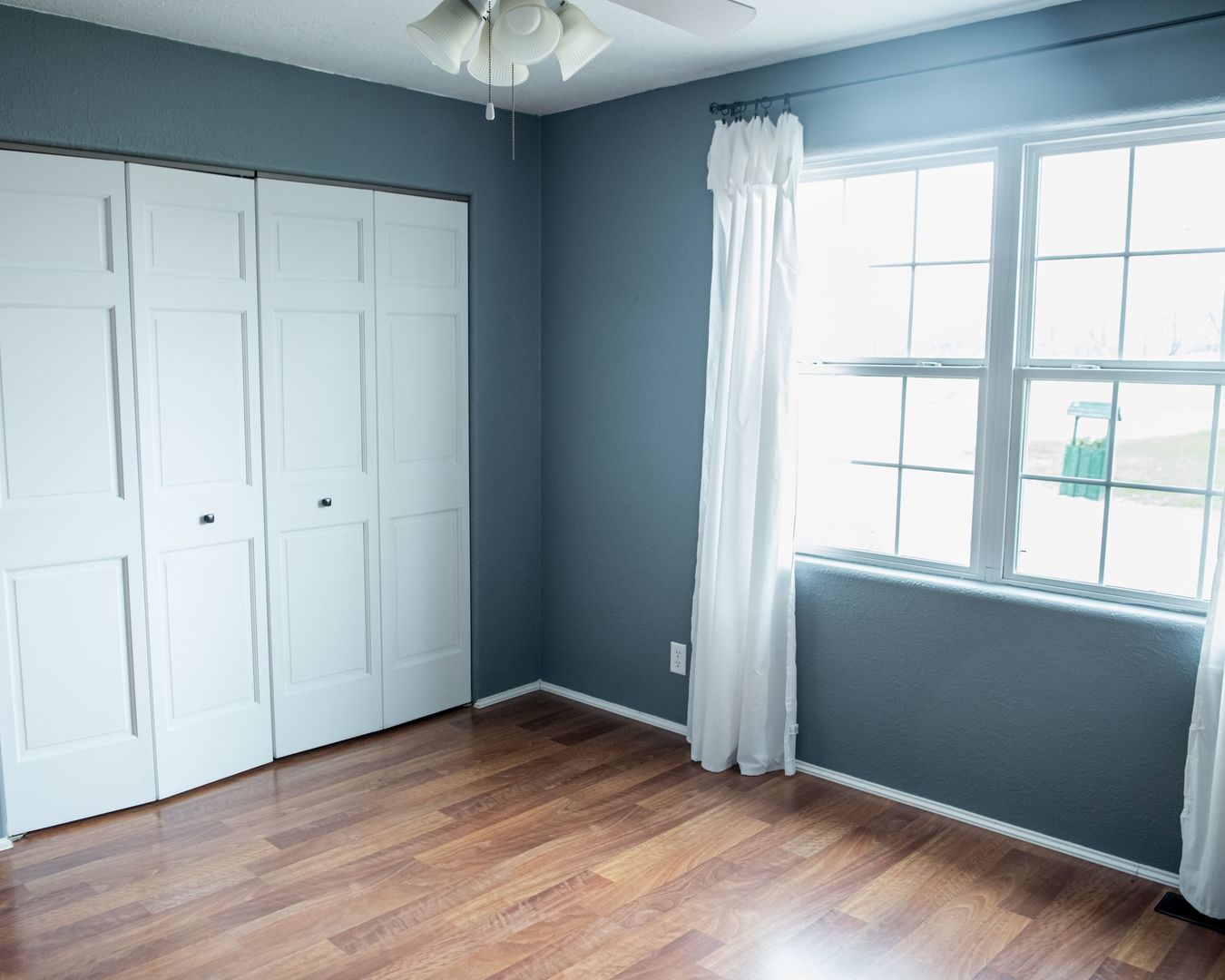 20532 Pilgrim Road Chadwick, IL 61014 - Photo 29 of 54 an empty room with wooden floor and windows