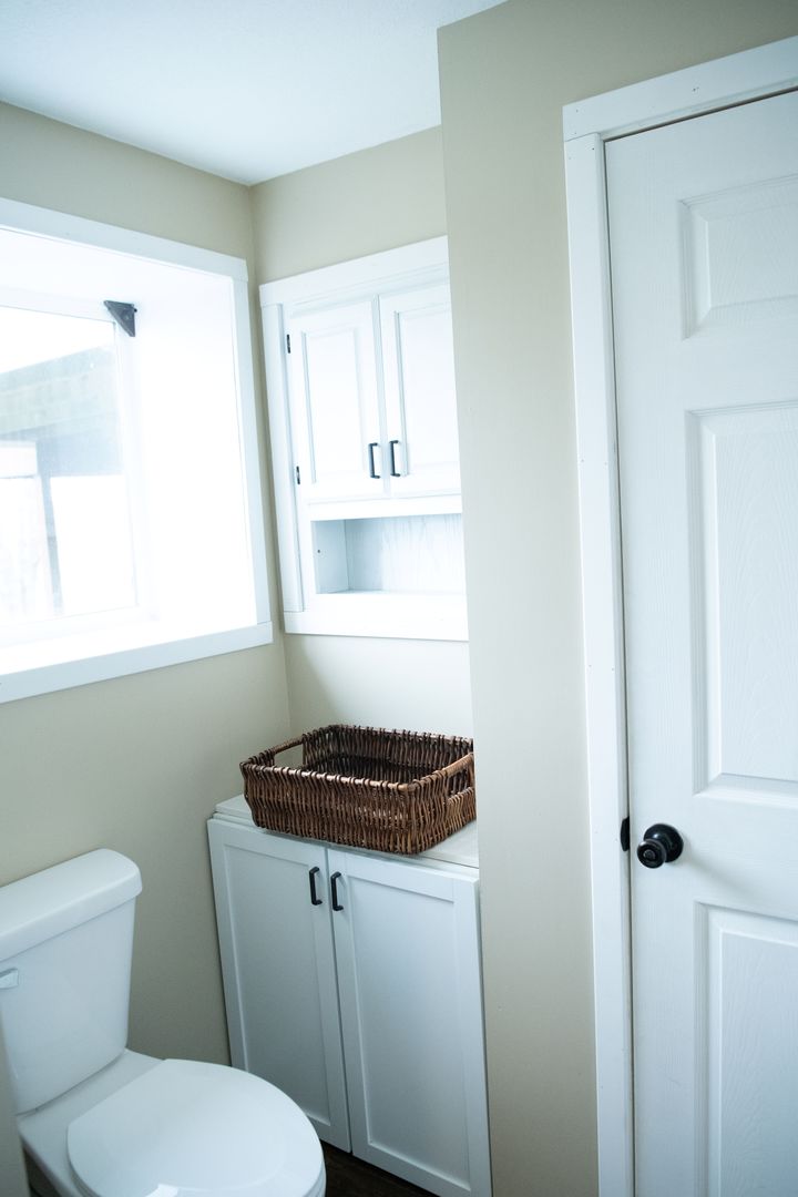 20532 Pilgrim Road Chadwick, IL 61014 - Photo 50 of 54 a bathroom with a toilet a sink and a window