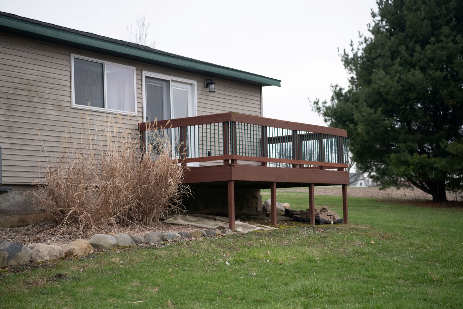 20532 Pilgrim Road Chadwick, IL 61014 - Photo 8 of 54 a backyard of a house with table and chairs