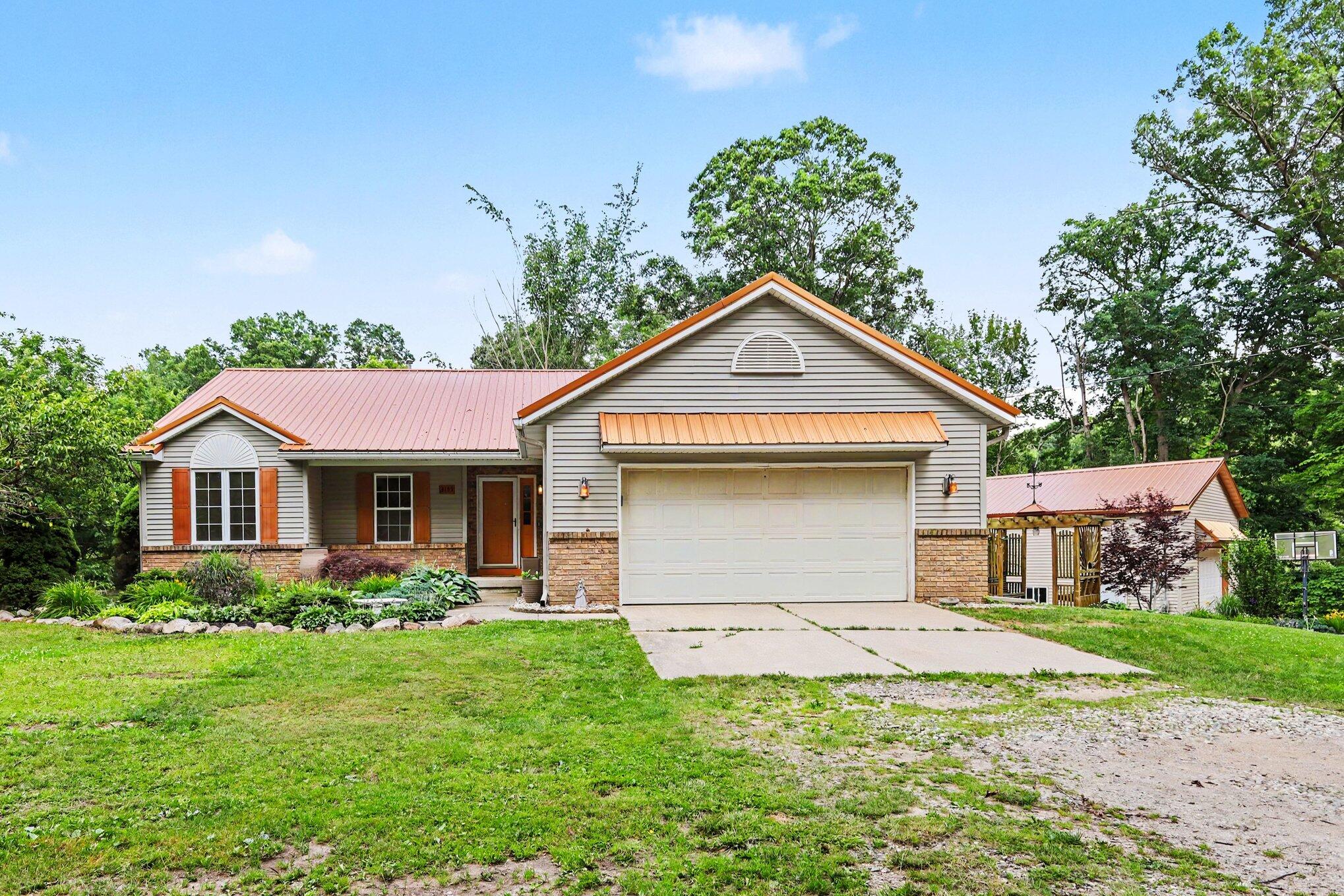 3155 11 Mile Road Northeast Rockford, MI 49341 - Photo 3 of 33 011_file_5155