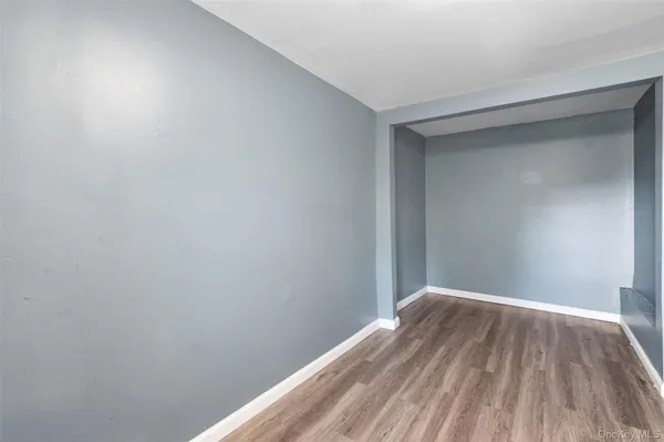 a view of small space with wooden floor