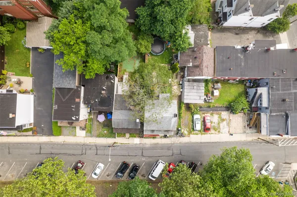an aerial view of a house with a garden