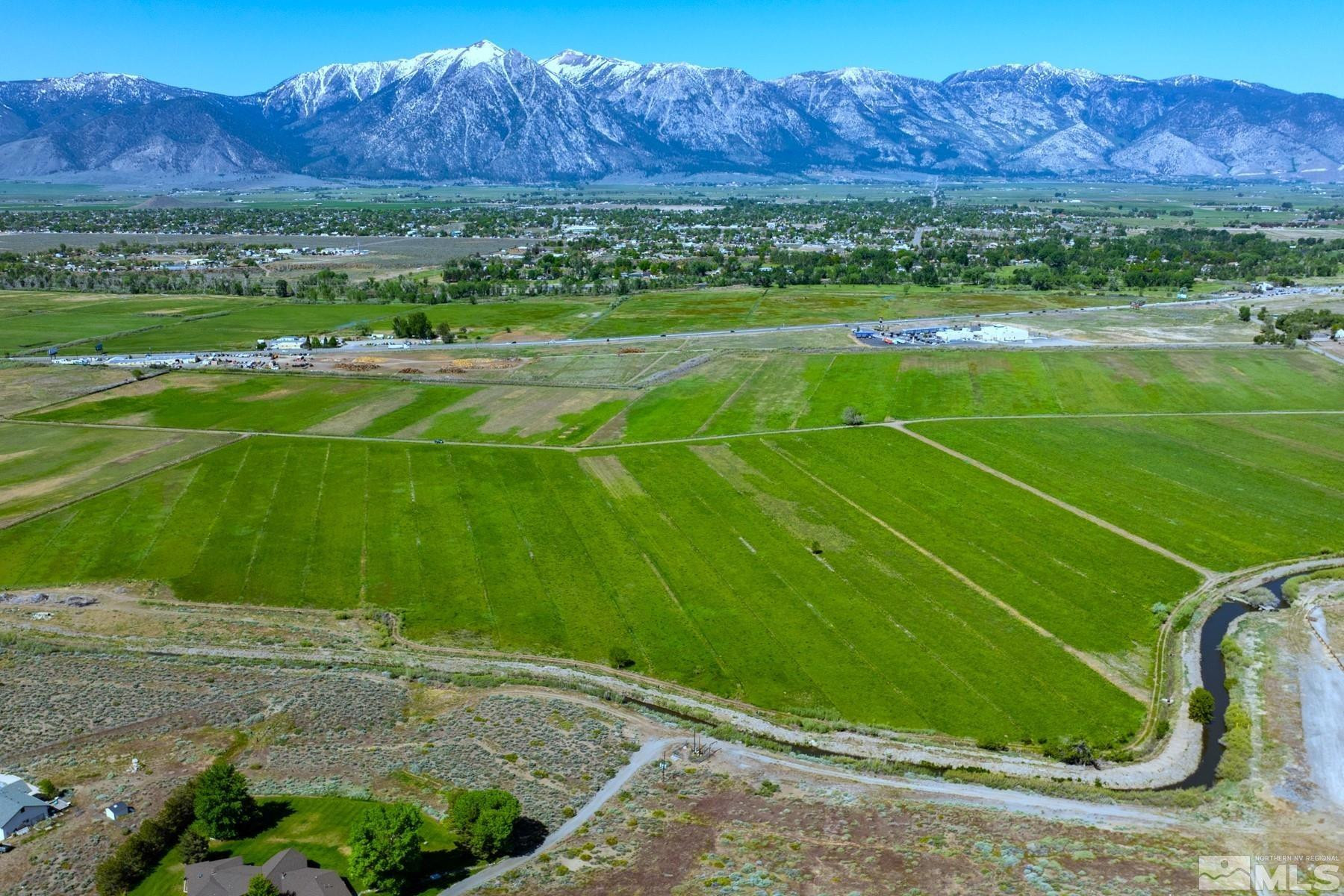 0 Pinenut Road Gardnerville, NV 89410 - Photo 2 of 12 a view of a golf course with a field