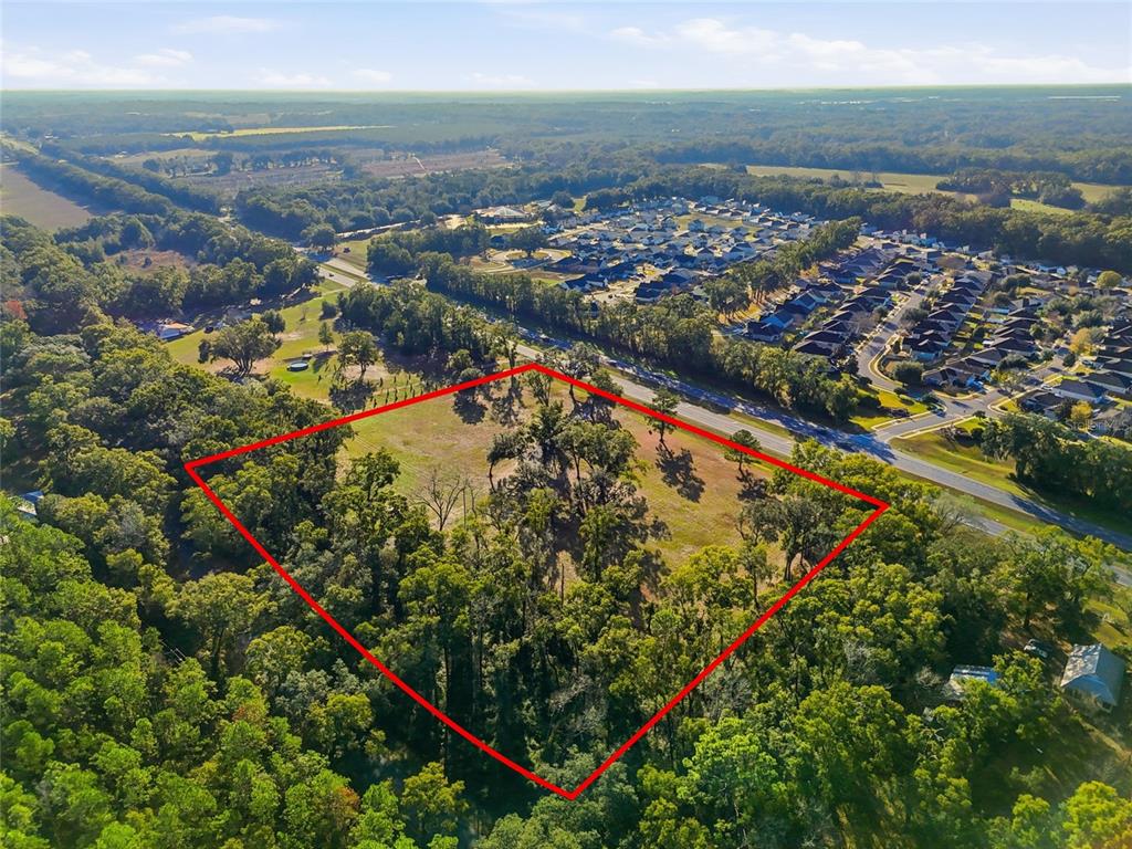 441 High Springs High Springs, FL 32643 - Photo 2 of 9 an aerial view of residential houses with outdoor space and ocean view