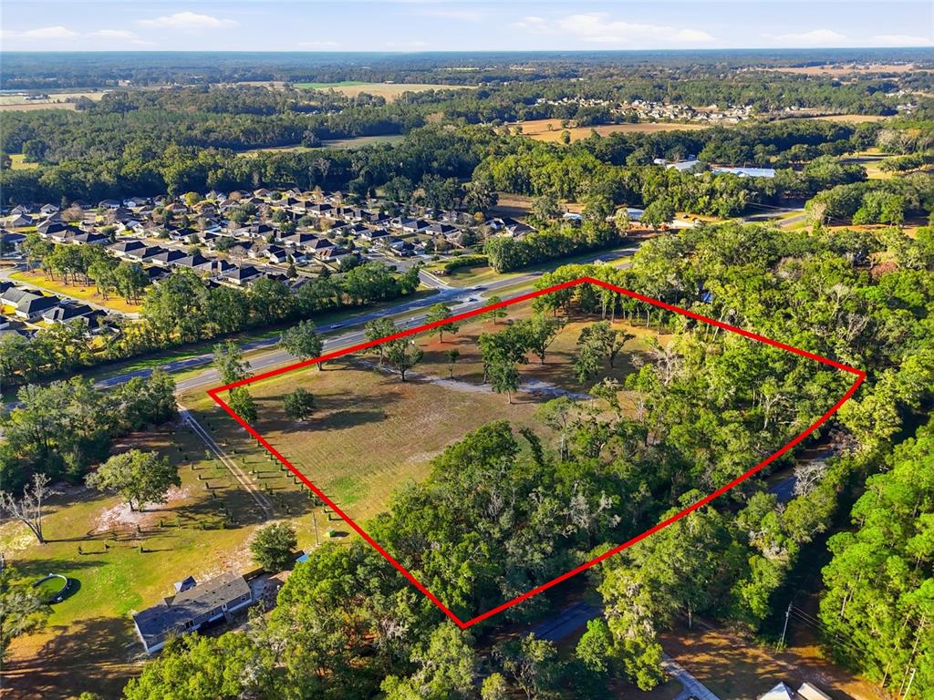 441 High Springs High Springs, FL 32643 - Photo 3 of 9 an aerial view of residential houses with outdoor space and swimming pool