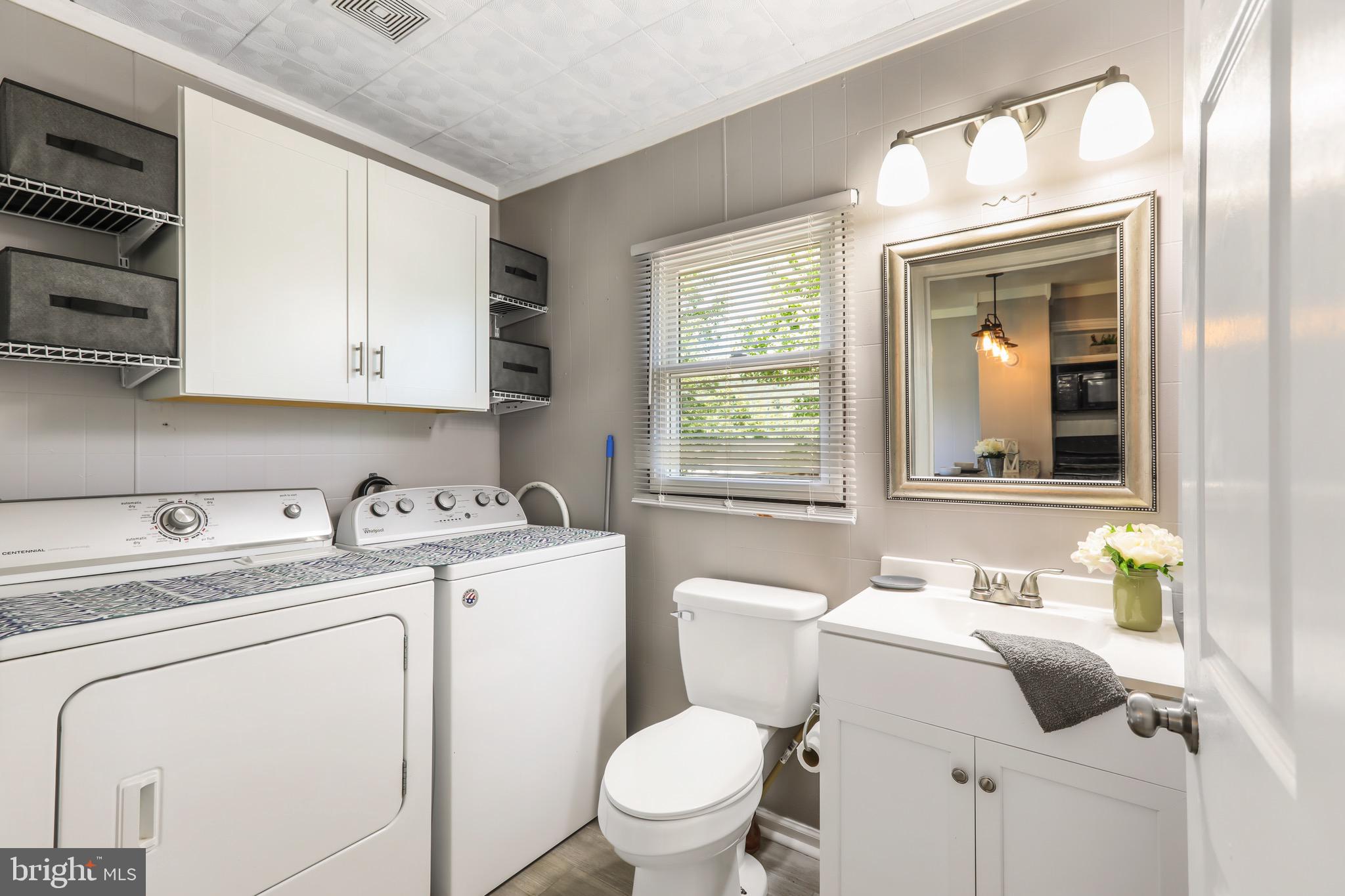13609 Brant Road Southwest Cresaptown, MD 21502 - Photo 22 of 23 a view of bathroom with a toilet sink and mirror