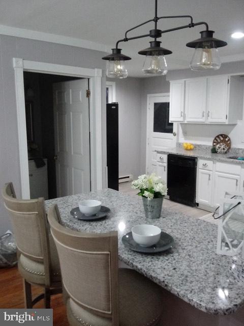 13609 Brant Road Southwest Cresaptown, MD 21502 - Photo 5 of 23 a kitchen with a table and chairs in it