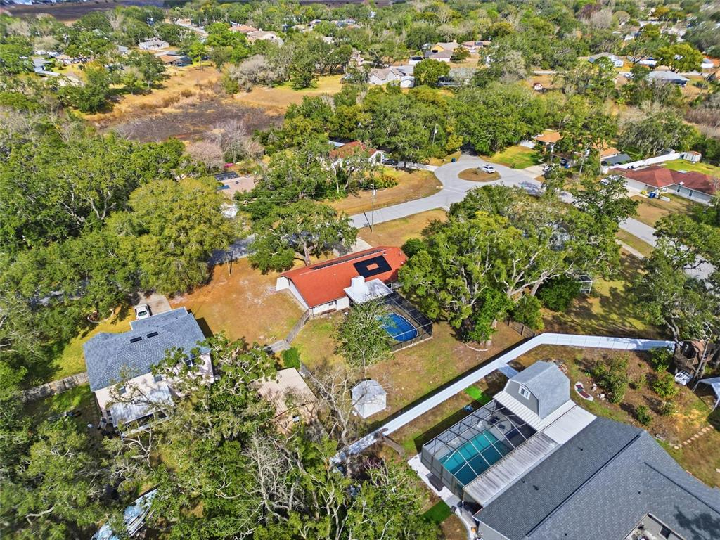 8398 Begonia Street Spring Hill, FL 34608 - Photo 30 of 32 an aerial view of a house with a yard