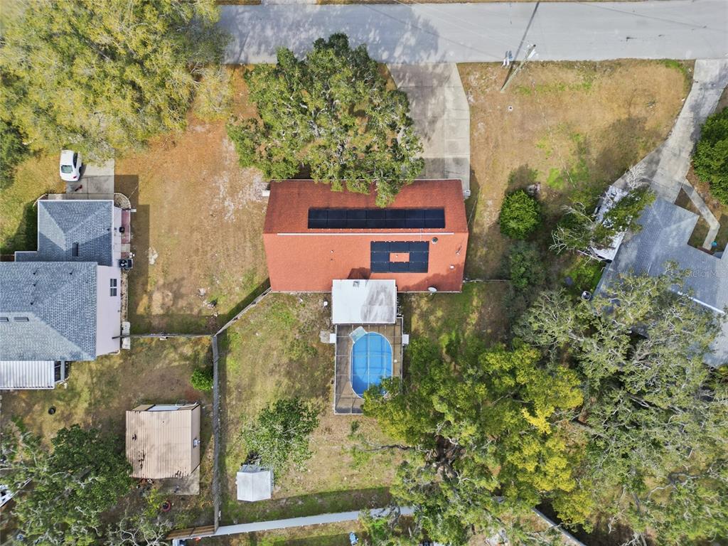 8398 Begonia Street Spring Hill, FL 34608 - Photo 32 of 32 an aerial view of a house with a yard and plants