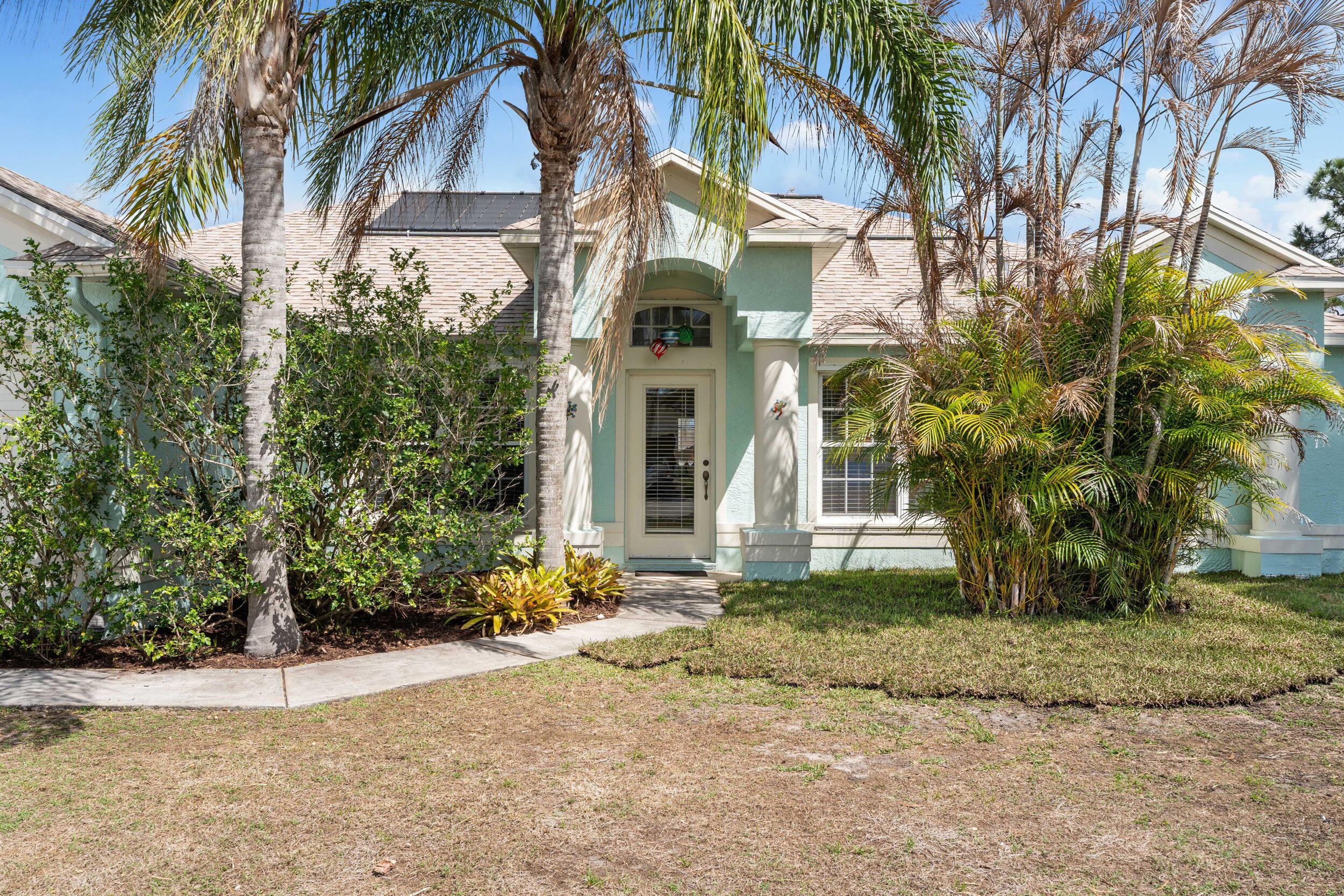 5593 Northwest Wesley Road Port St. Lucie, FL 34986 - Photo 28 of 33 Front covered entryway