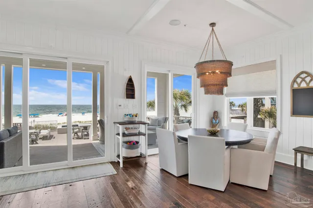 a spacious bedroom with a bed and a flat screen tv