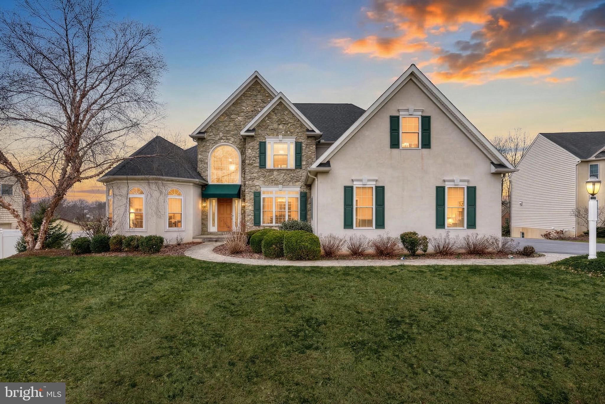 Beautiful curb appeal with a well-maintained lawn