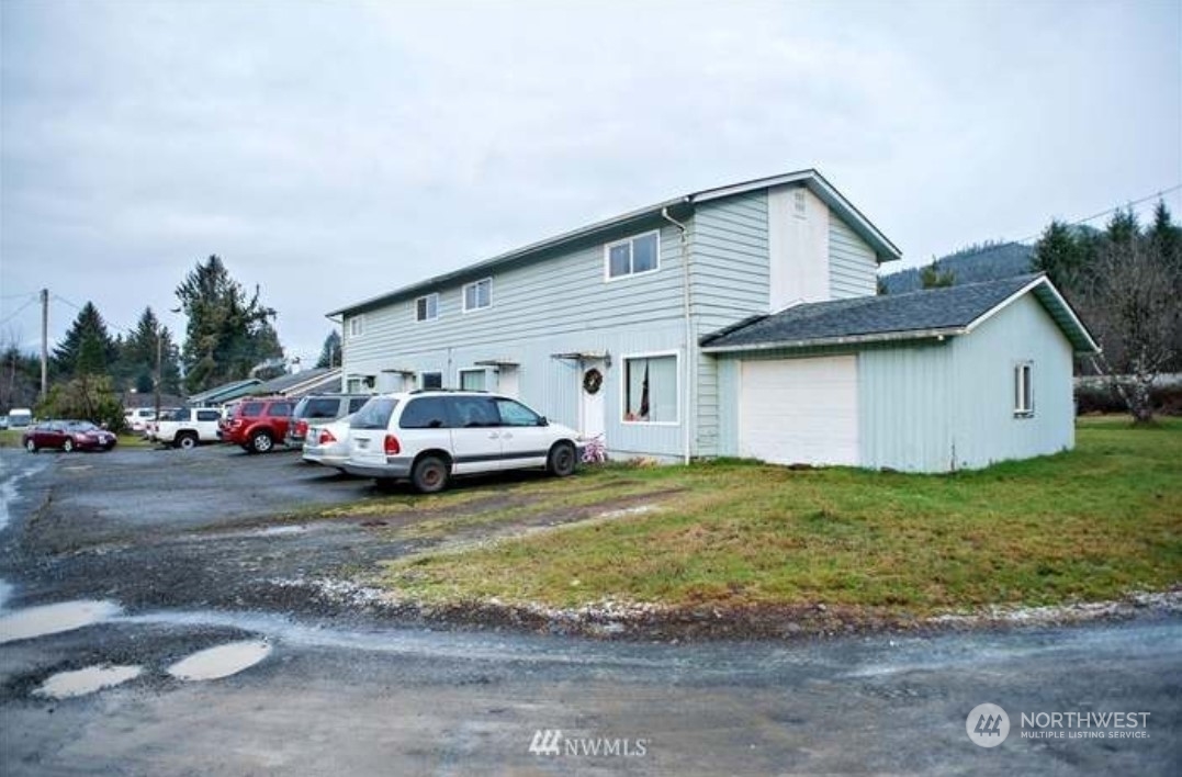 7 Neilton Lane Neilton, WA 98552 - Photo 2 of 11 a view of a house with a back yard