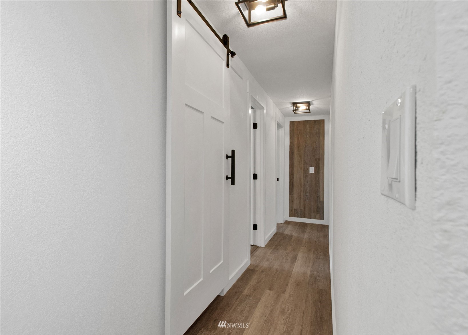 19128 Pecan Street Southwest Rochester, WA 98579 - Photo 12 of 31 a view of a hallway with a white walls