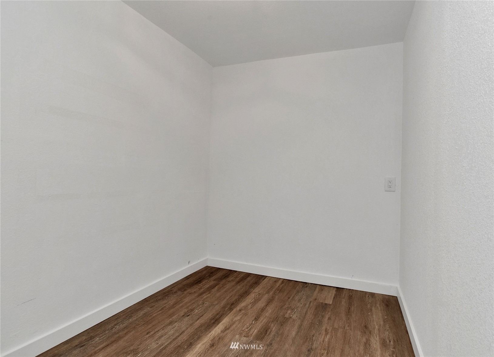 19128 Pecan Street Southwest Rochester, WA 98579 - Photo 25 of 31 a view of an empty room with wooden floor