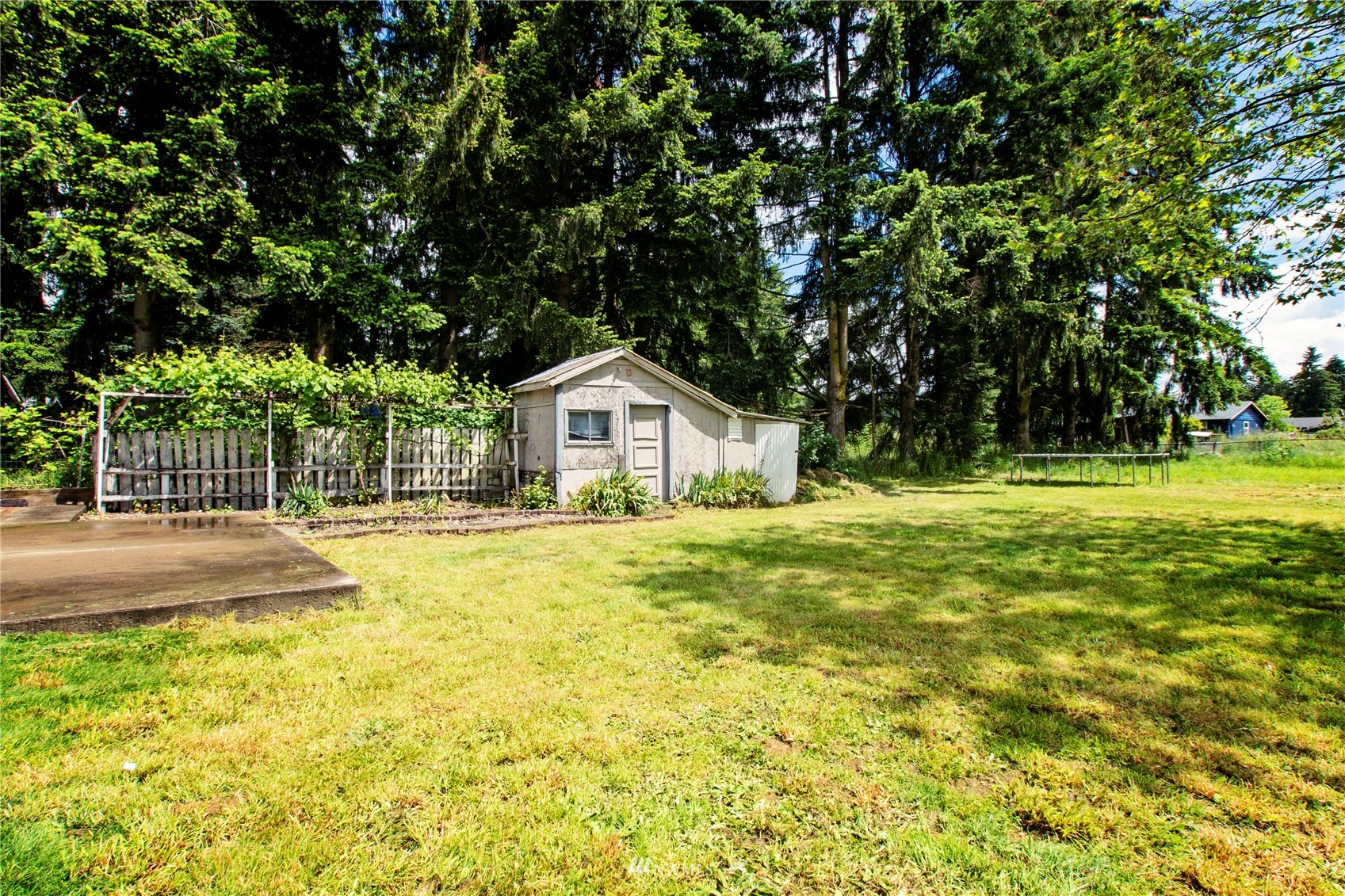 19128 Pecan Street Southwest Rochester, WA 98579 - Photo 28 of 31 a house view with swimming pool in front of it
