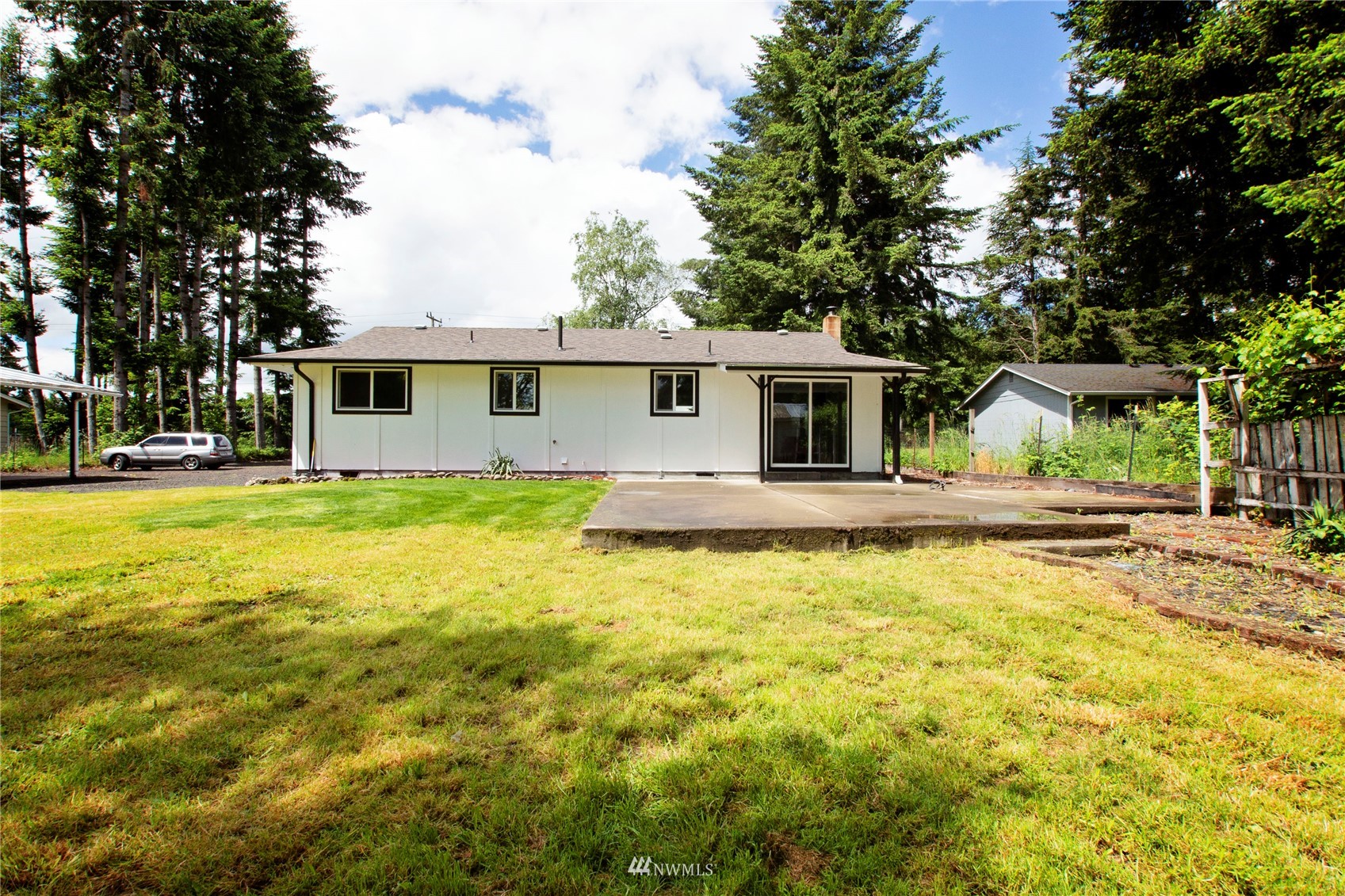 19128 Pecan Street Southwest Rochester, WA 98579 - Photo 31 of 31 a front view of house with yard and trees
