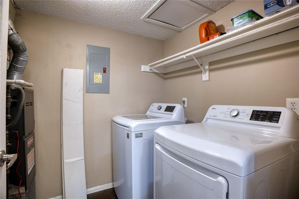 32 Springhedge Ct Street Smyrna, GA 30080 - Photo 17 of 29 a utility room with dryer and washer
