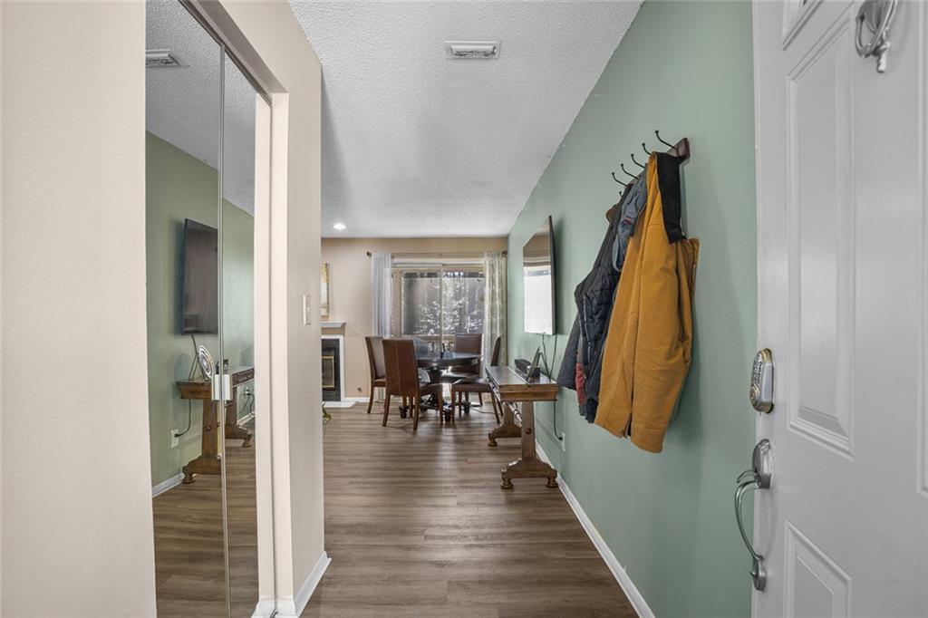 32 Springhedge Ct Street Smyrna, GA 30080 - Photo 22 of 29 a view of a living room with furniture and wooden floor