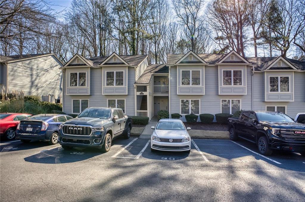32 Springhedge Ct Street Smyrna, GA 30080 - Photo 23 of 29 a front view of a house with parking space