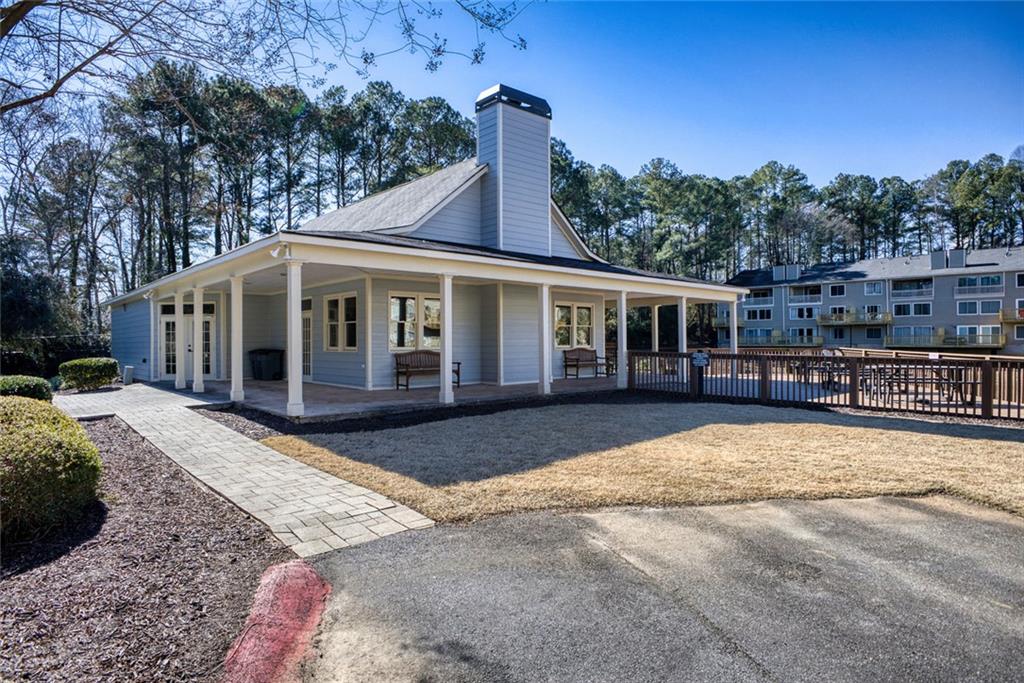 32 Springhedge Ct Street Smyrna, GA 30080 - Photo 28 of 29 a view of a house with backyard porch and sitting area