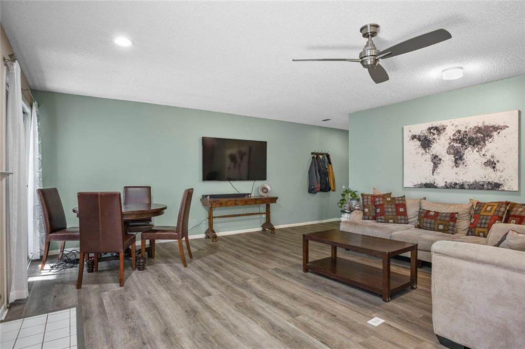 32 Springhedge Ct Street Smyrna, GA 30080 - Photo 5 of 29 a living room with furniture and a wooden floor