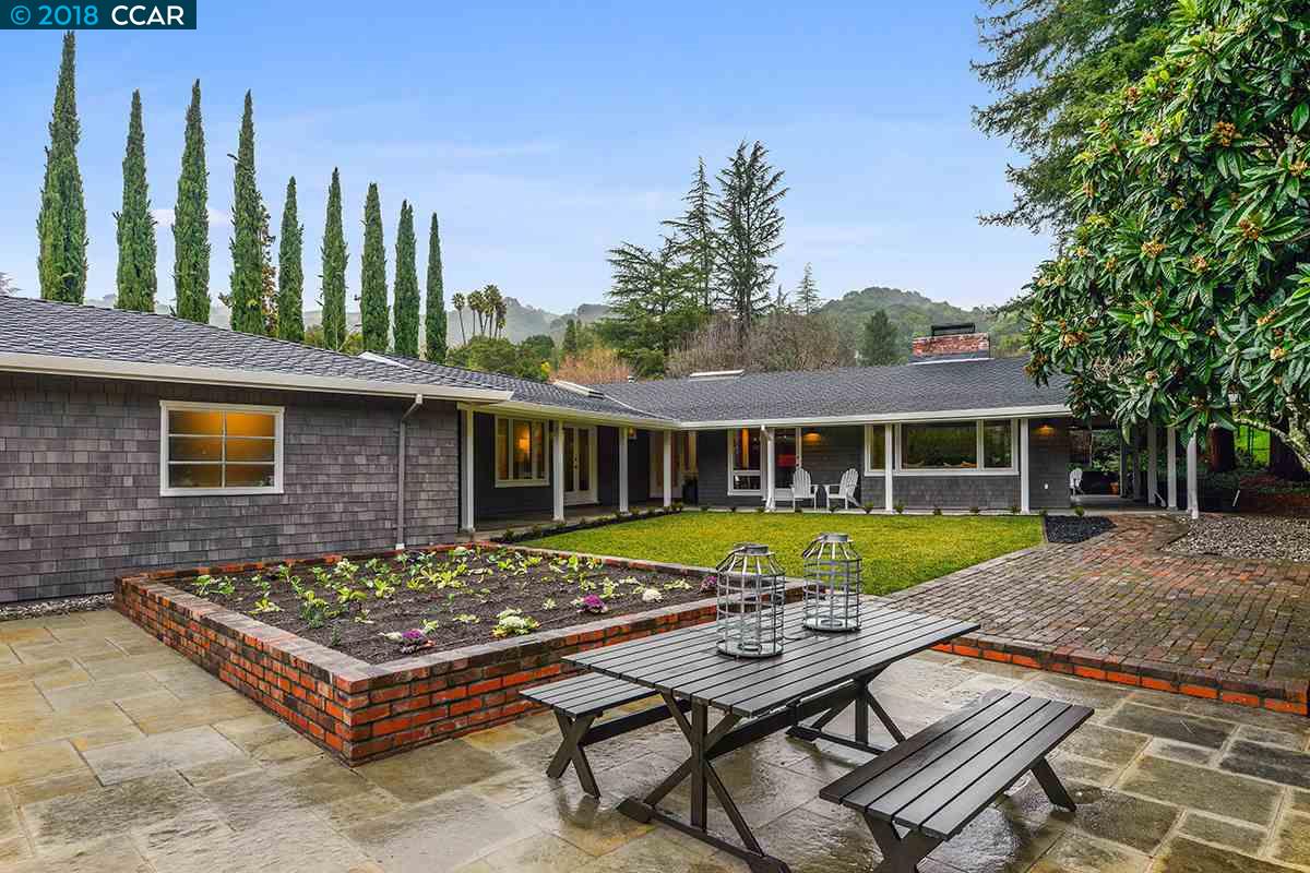 1168 Glen Road Lafayette, CA 94549 - Photo 1 of 1 a view of a house with backyard and sitting area