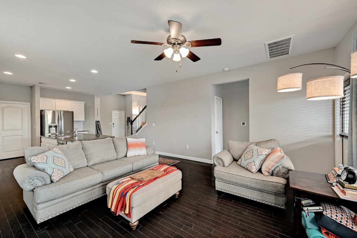 10104 Wading Pool Path Austin, TX 78748 - Photo 11 of 25 a living room with furniture and a ceiling fan