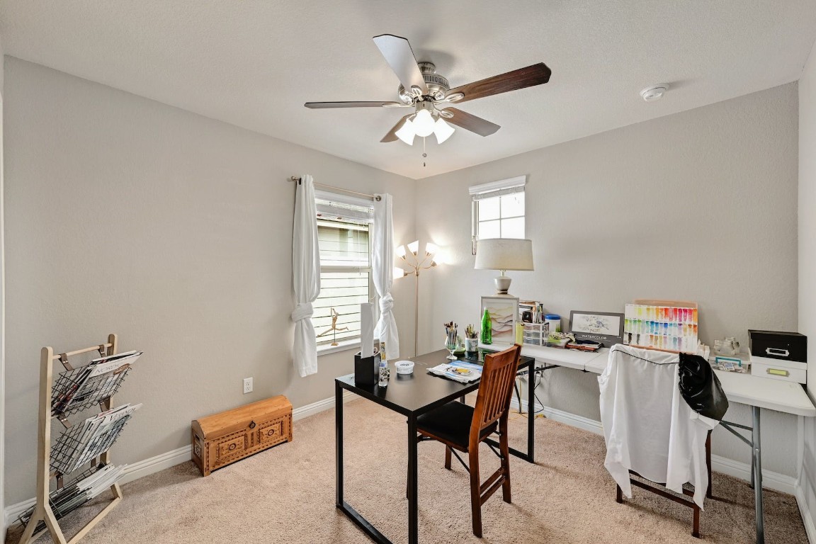 10104 Wading Pool Path Austin, TX 78748 - Photo 19 of 25 a view of a workspace with furniture and a window