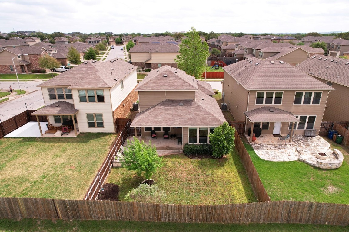10104 Wading Pool Path Austin, TX 78748 - Photo 2 of 25 an aerial view of a house with swimming pool and a yard